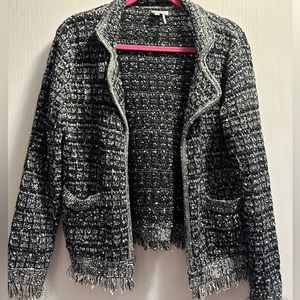 Sioni Women’s jacket. Size Med. Black and white. Fringe on the  bottom/Sleeves